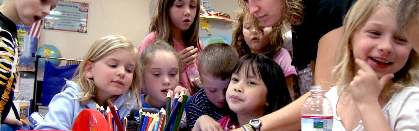 young students with teachers