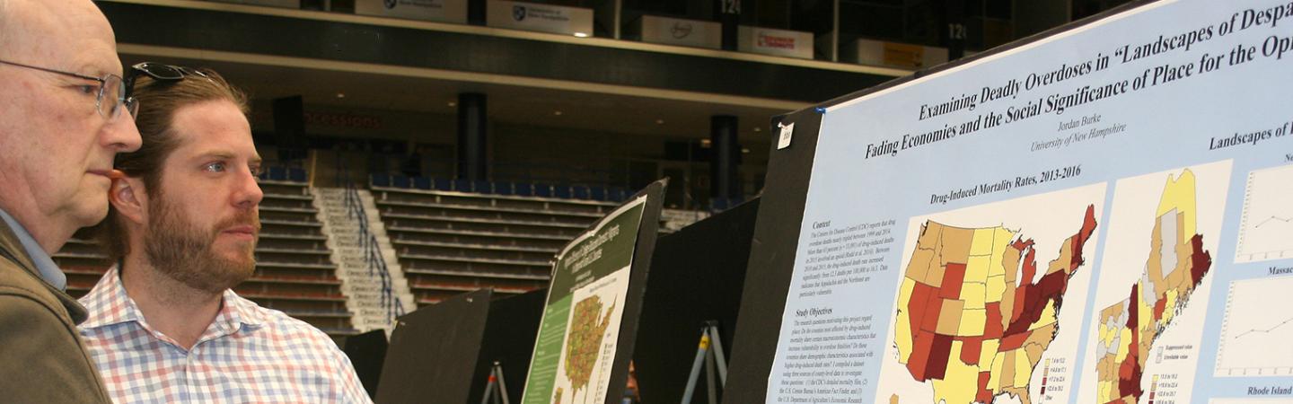 student presenting research