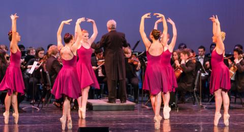 dancers and syphony in performance