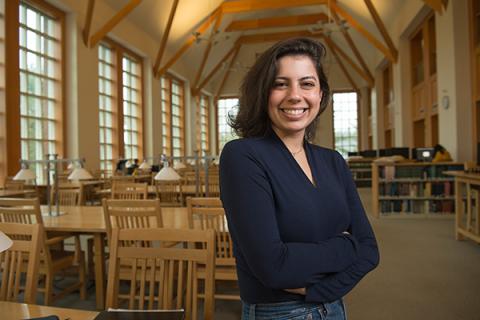 student in library