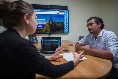 student in career coaching session