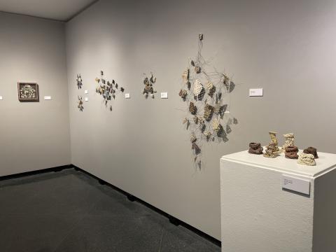 Interior of UNH Gallery of Art with works by BFA graduate Kelsey Loucks