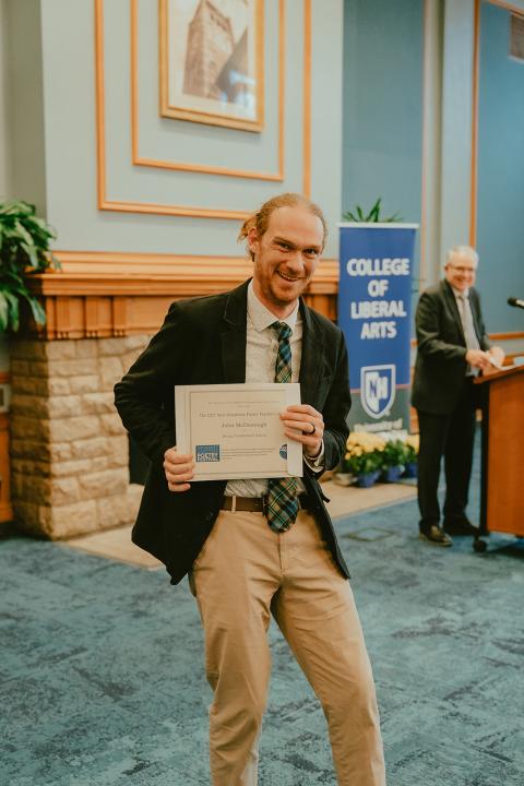 Teacher fellow winner at the UNH poetry festival