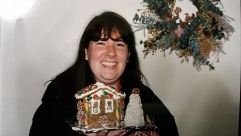 Woman with a Gingerbread House