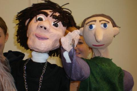 students with puppets