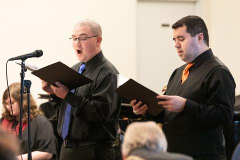 two men singing